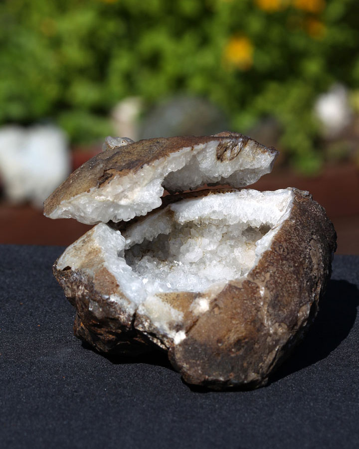 A shiny crystal within a grey rock